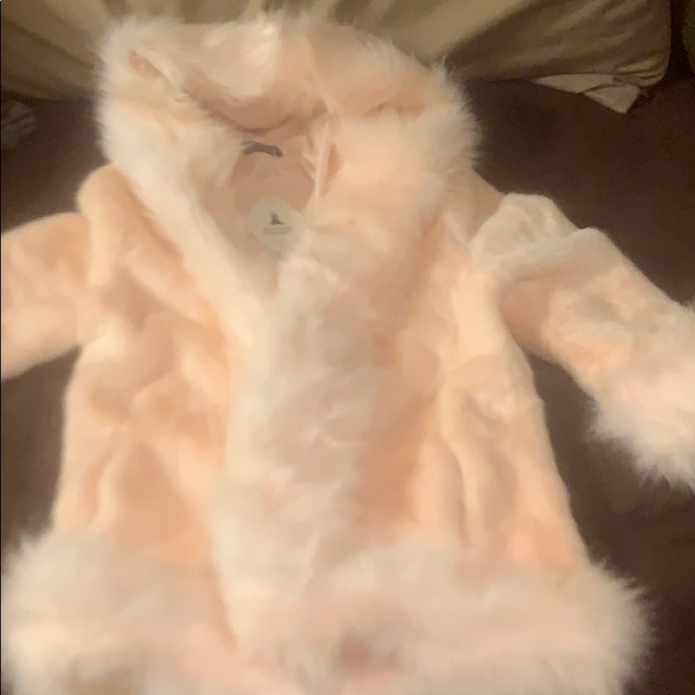 Woman’s size a small pink faux fur coat